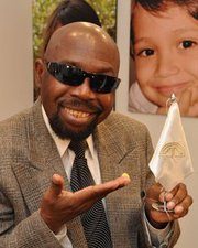 Lalo Izquierdo in dark glasses